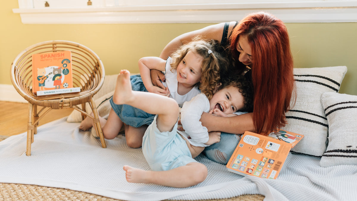 A Mom is playing with her two kids. Fun family activities, quality time