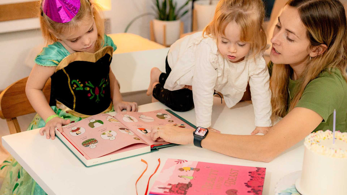 Mom reads to her daughters
