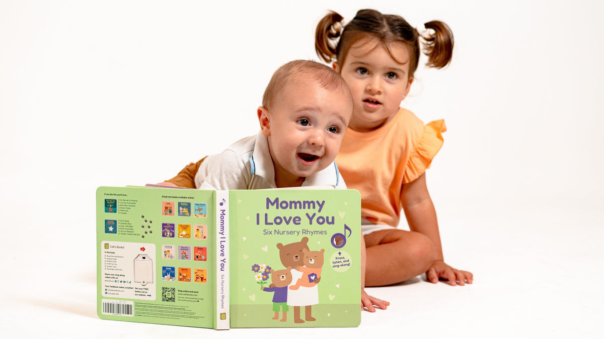 Two toddlers are reading a book. Mothers day, mothers day gift, art and craft, kids gifts.